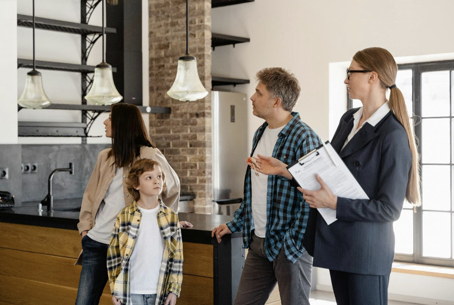 Realtor Showing a Family Around