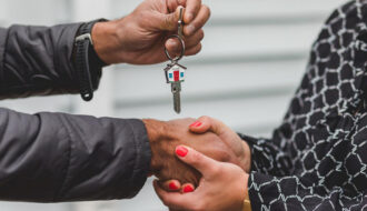 Realtor handing over keys