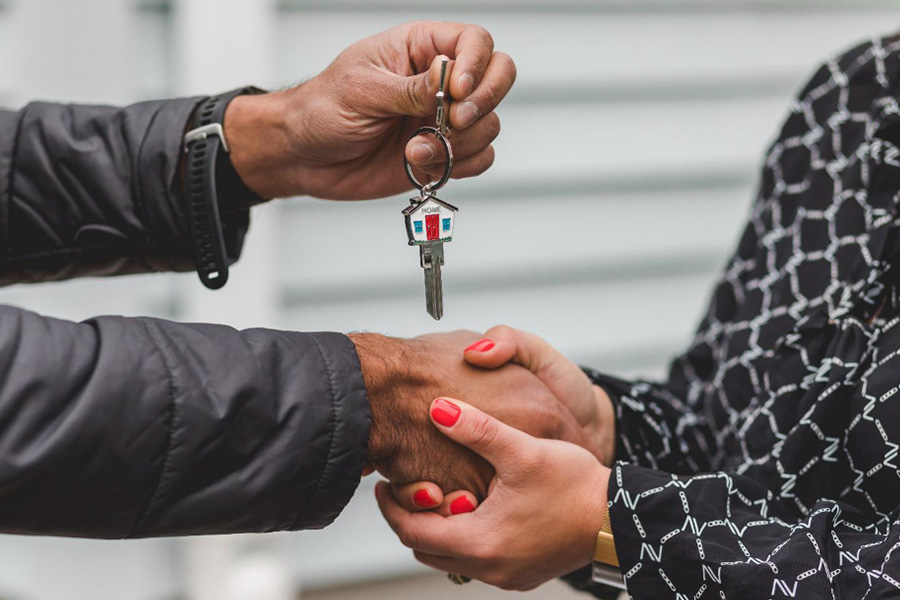 Realtor handing over keys
